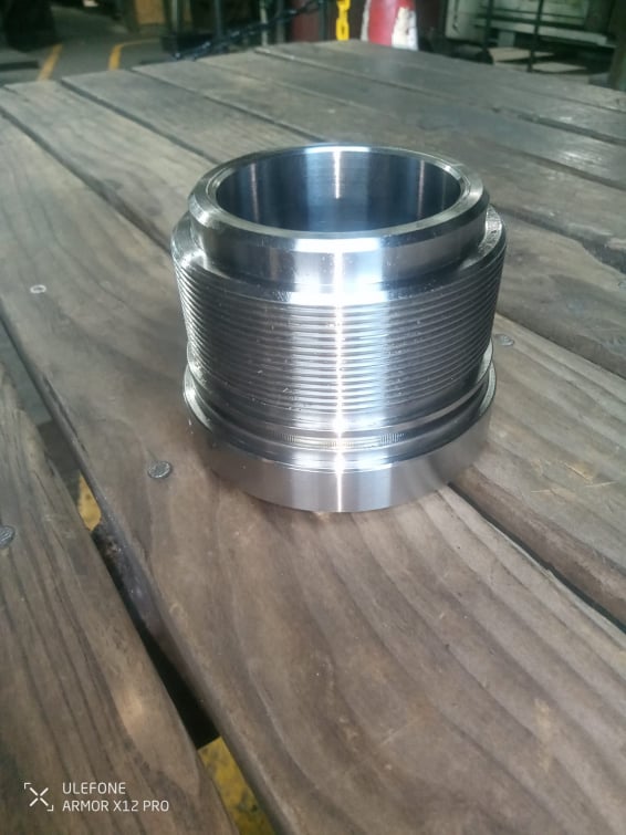 Hydraulic gland head